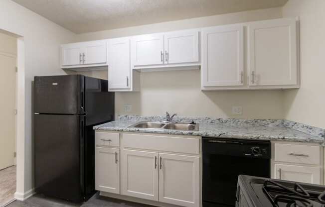 This is a photo of the kitchen in the 543 square foot A-style, 1 bedroom, 1 bath apartment at Blue Grass Manor Apartments in Erlanger, KY.