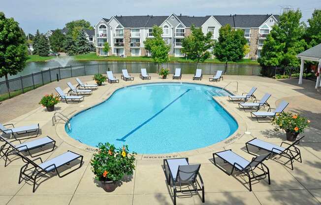 Gated Outdoor Pool and Sundeck at Hillside Apartments, Wixom, Michigan