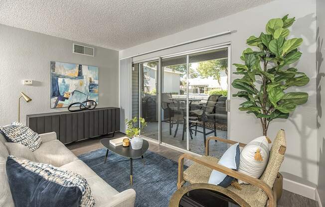 Living room with patio l Vue at the Lake in Sacramento
