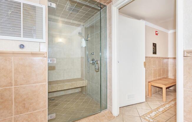 a kitchen with a sink and a shower