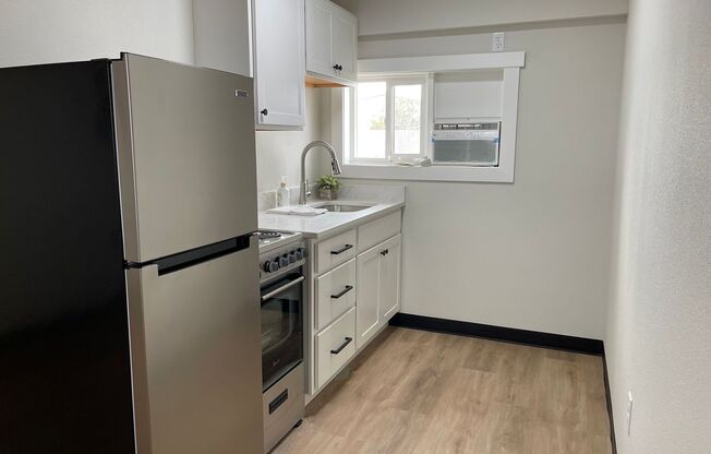 2128 W Broadway- The Gem Apartments