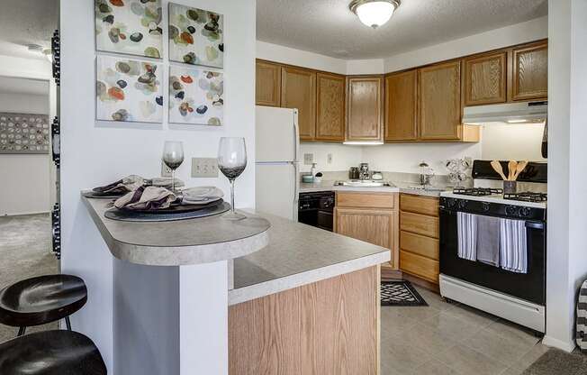 Kitchen and Breakfast Bar at Ashmore Trace Apartments