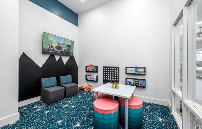 a study room with a table and chairs and a window at Fairmont at South Lake, Maryland, 20716