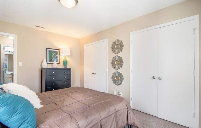 Model home bedroom at Arrowood Crossing Apartments in Charlotte, NC