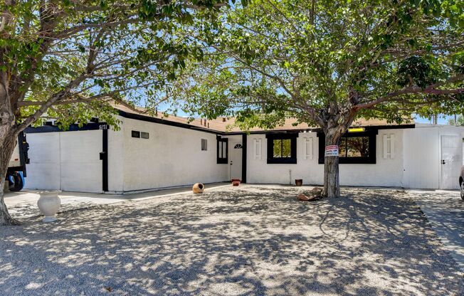 Flexible 4-Bedroom Main Residence with 3 Attached Studios – 7-Bedroom Potential