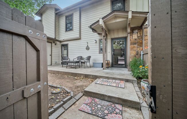 CORNER CONDO WITH FENCED YARD AND ALL APPLIANCES