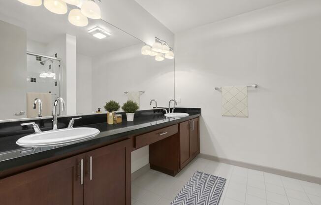 Bathroom with two sinks at San Pedro Bank Lofts, San Pedro, CA, 90731