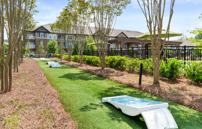 Outdoor Lounge with Cornholes