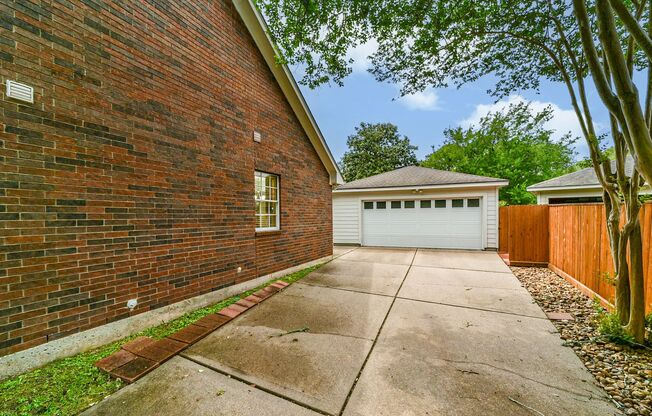 Executive two-story home nestled in the desirable Brookwood neighborhood!