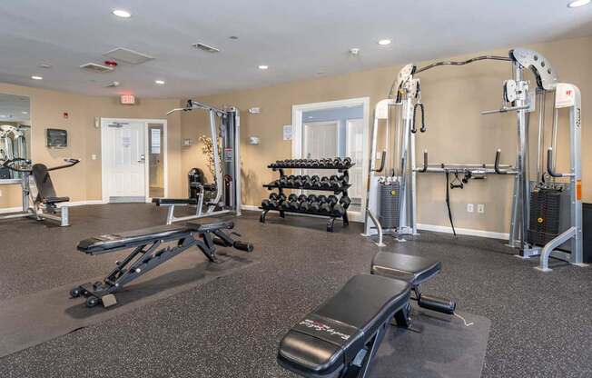 Parkside Commons gym with a variety of equipment including a leg press machine.