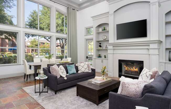 A living room with a fireplace and a couch.