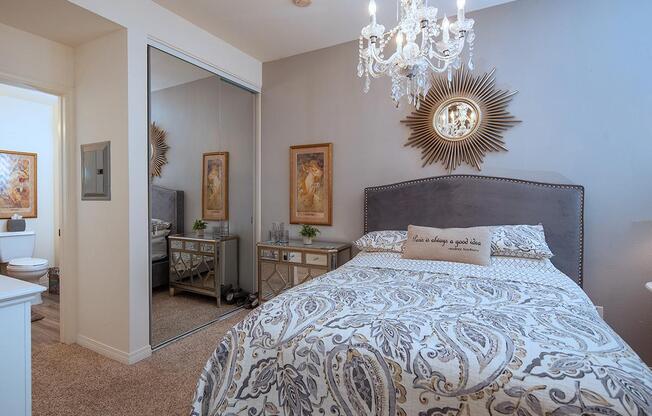 a bedroom with a large bed in a room