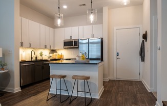 Stainless steel appliances including side-by-side refrigerator