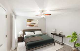 Hunters Pointe Apartments in Charlotte North Carolina photo of a bedroom with a bed and a ceiling fan