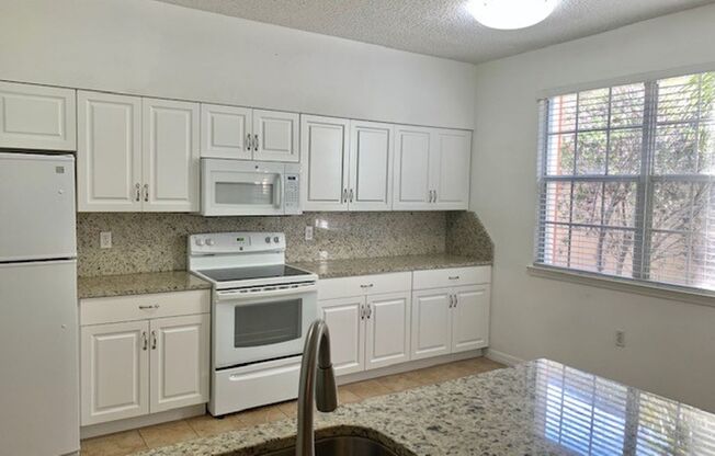 MOVE IN BY JUNE 15TH and RECEIVE THE REST OF JUNE FREE!!!  Gorgeous 2-Bed, 2-Bath Condo with Pond and Fountain Views at Palm Villas Condominiums!