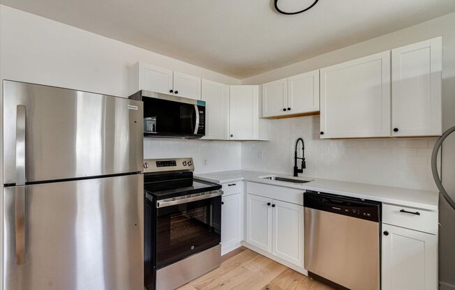 FULLY RENOVATED duplex in East Ridge!