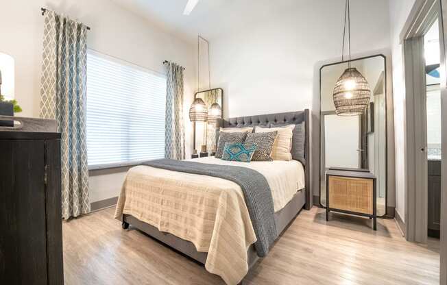 A Spacious Bedroom with Large Windows at The Bridge at McKinney, McKinney, Texas, 75069