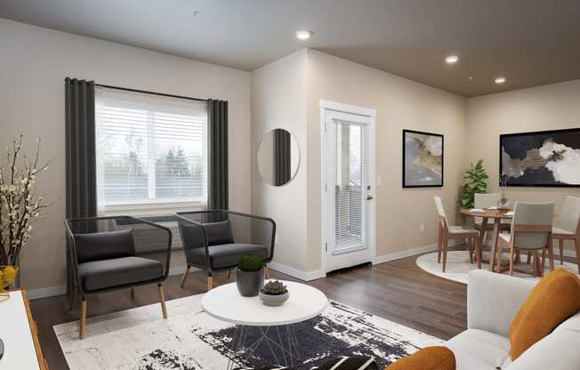 a living room with a couch and chairs and a table