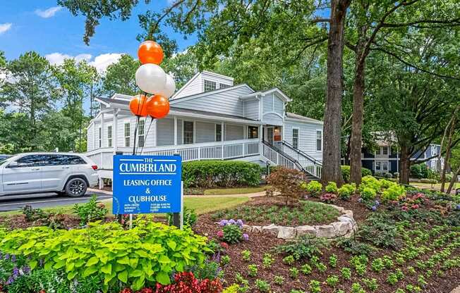 a house with a sign in front of it