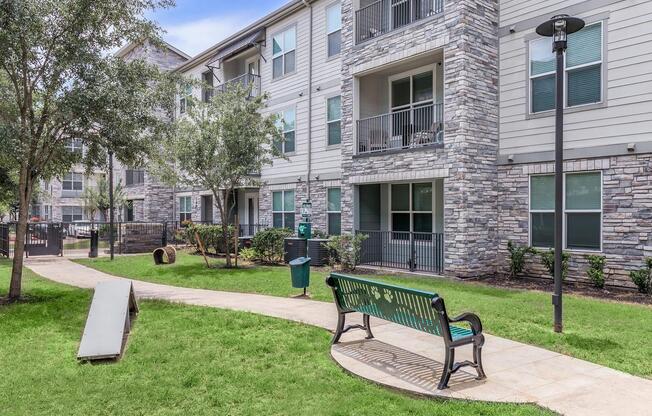 a park bench in front of a building