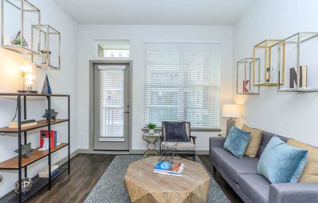 a living room with a couch and a coffee table