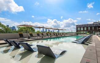 Relaxing Pool Area with Stunning City Views