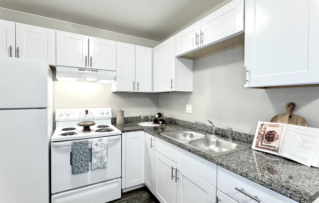 Upgrade your cooking experience in select units with sleek granite countertops and functional kitchen layouts.