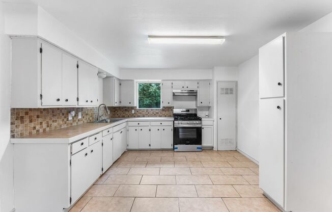 CENTRAL CITY FOUR BEDROOM TWO BATH HOUSE!