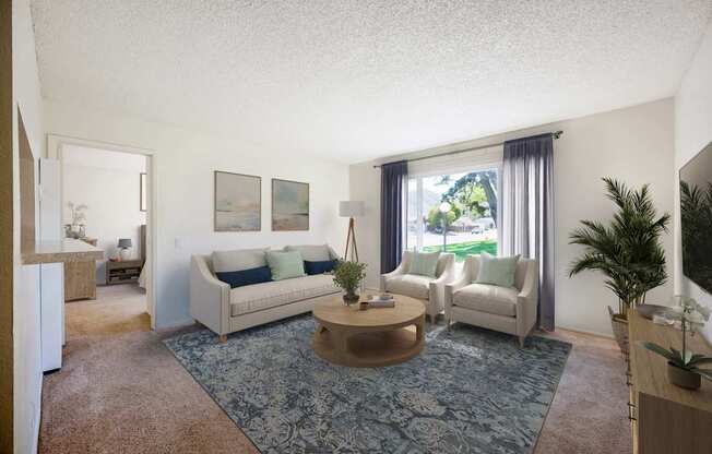 A living room with a couch, chair, and coffee table.