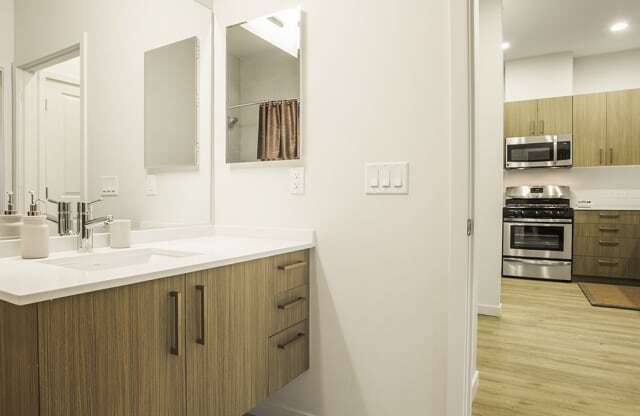 Bathroom across kitchen