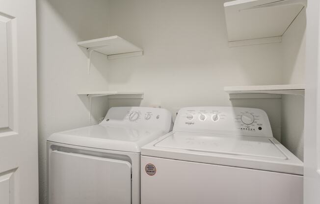 a washer and dryer in a laundry room