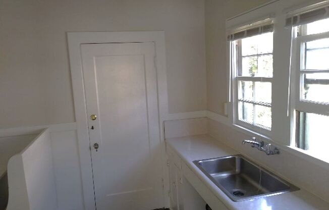 Unit has newer appliances and flooring in bathroom