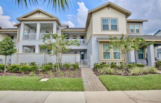 Stunning 2/2 Modern Townhome with a Bonus Room and a Spacious 2 Car Garage in the Desirable Laureate Park Community in Lake Nona - Orlando!