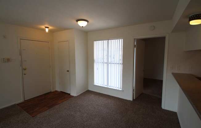 This is a photo of the living room of the 846 square foot 2 bedroom apartment at The Biltmore Apartments in Dallas, TX.