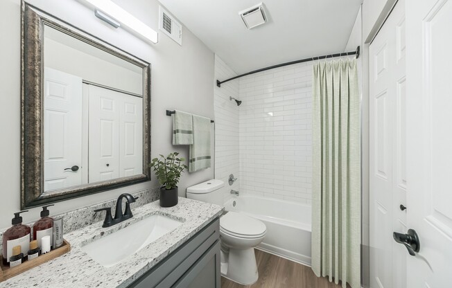 Elevate your living at Eagle Rock Apartments at Columbia, where modern design meets comfort. This stunning bathroom features elegant finishes and ample space for your relaxation needs. Schedule a visit today and envision your new home!