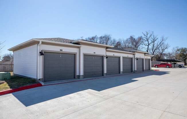 a row of garages at 55 Fifty at Northwest Crossing, Houston Texas