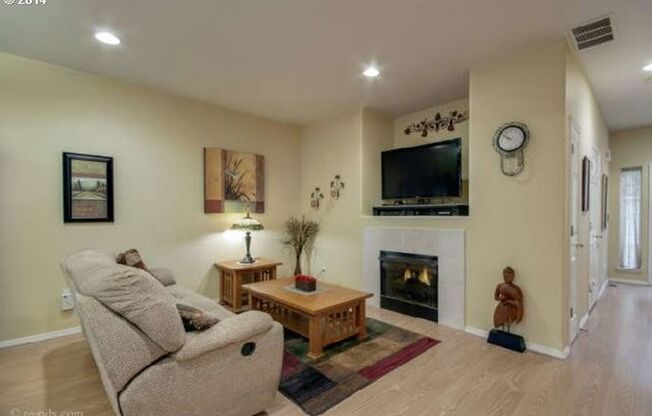 Spacious 3-Bedroom Townhouse with Open Living Areas and Private Patio
