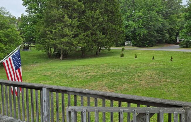 Lovely Rambler on large corner lot