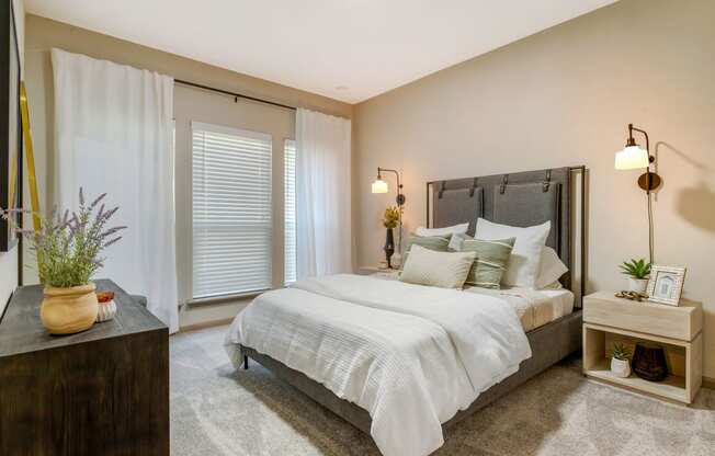 a bedroom with a bed and a window at Summerwind, Texas