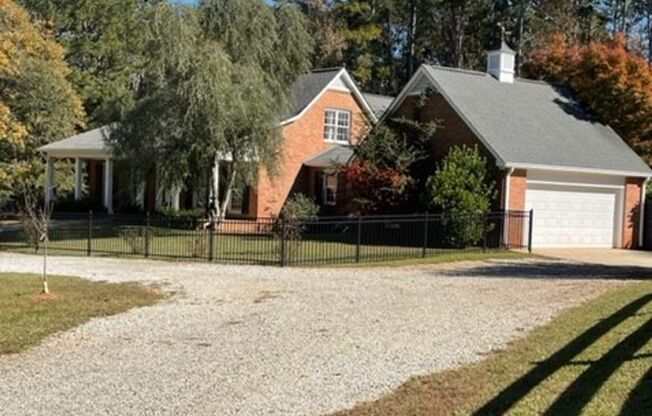 Beautiful updated 4BR/2.5BA home on 8.3 acres, with pool!