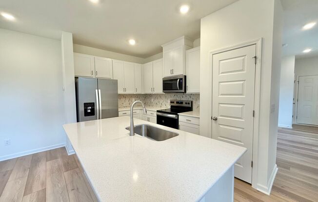 Stunning New Construction 3BD, 2.5BA End Unit Wake Forest Townhome in a Prime Location Near Shopping & Dining, with Easy Access to Raleigh