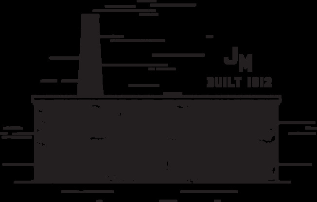 A black and white image of a building with the text "JM BUILT 1912" on it.