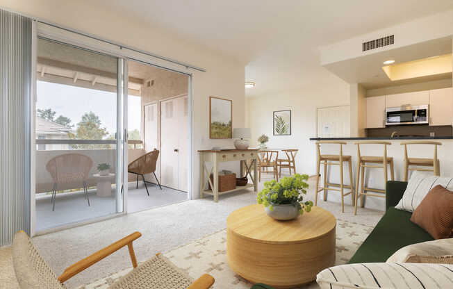 Carpeted Living Room with Balcony