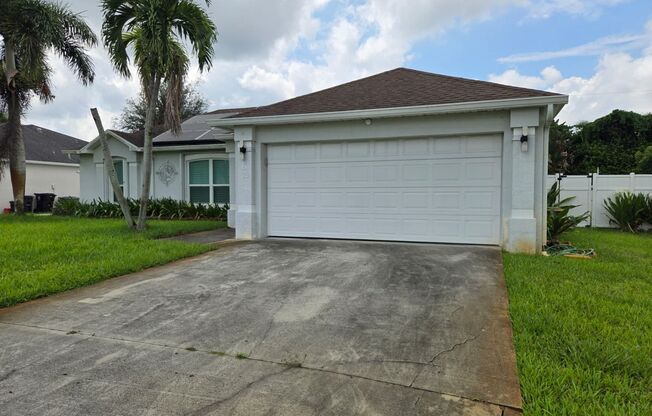 Port St. Lucie Single-Family home with Fenced Yard and Pool! FULLY FURNISHED!