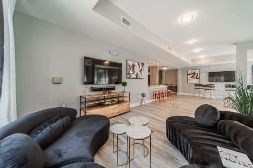 a living room with a couch and a tv