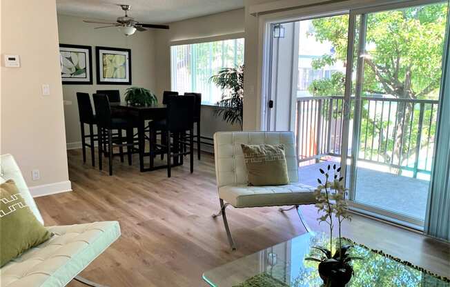 2 bedroom model dining room with window, 6 seater dining table . this model has hardwood flooring