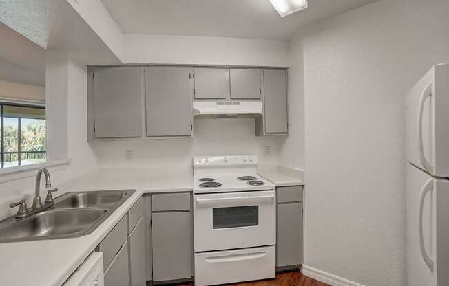 the preserve at ballantyne commons apartment kitchen with white appliances