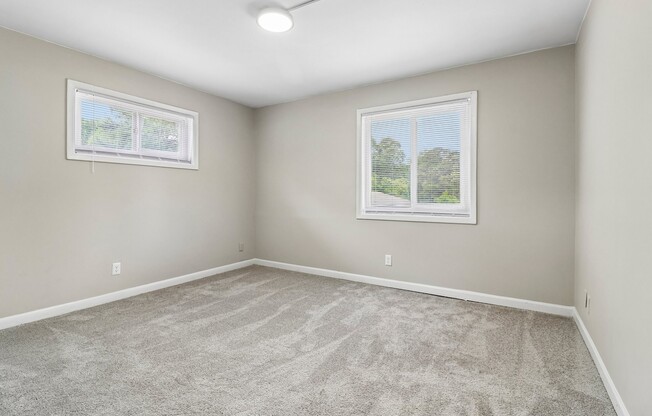 Step into the serene living spaces at The Preserve On Conley Apartments, where natural light floods every corner. Enjoy the soft gray tones and spacious layout that creates an inviting atmosphere. Explore your new home today!