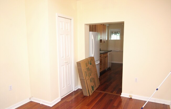 Charming Locust Point 2bd+Den/1ba Rowhome w/ W/D, CAC and One-Car garage! Available 7/15!