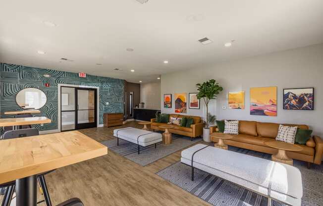 a living room with couches and chairs and a table